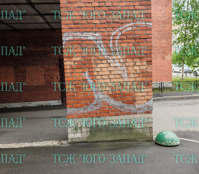 Устранение несанкционированных надписей на фасаде дома